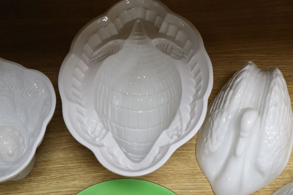 A small collection of Royal Doulton Dutch Harlem seriesware and five white-glazed jelly moulds,